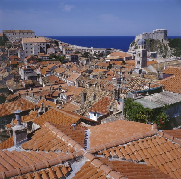 CROATIA, Dubrovnik, View over the city roof tops with red tiled rooves
