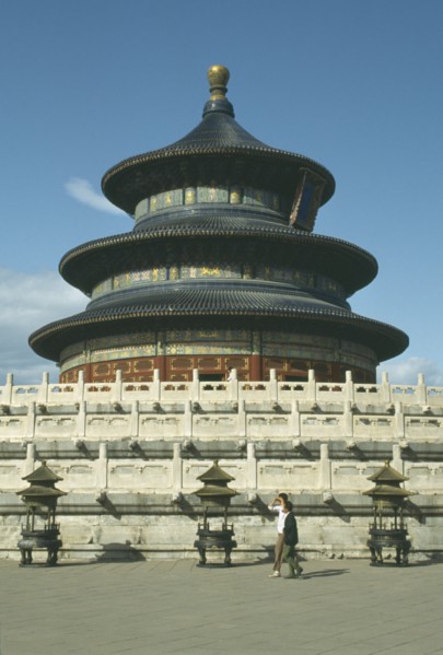 CHINA, Hebei, Beijing, Temple of HeavenRound temple standing on a square base with passing men