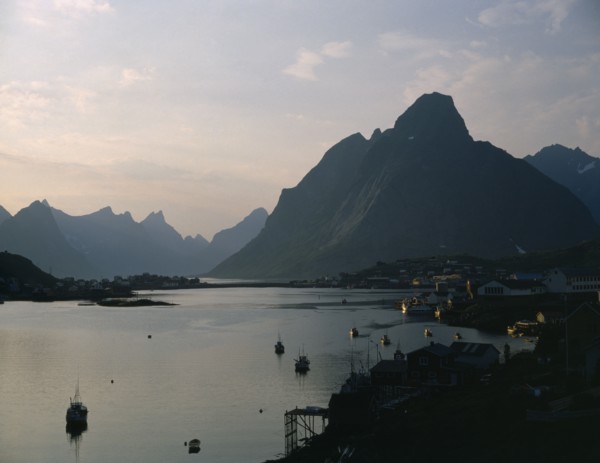 NORWAY, Nordland, Lofoten Islands, "Reine.  Midnight sun, mountains and fjord "