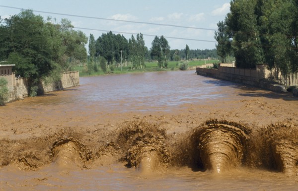 CHINA, Yinchuan, Yellow River, View up the muddy irrigation canal.