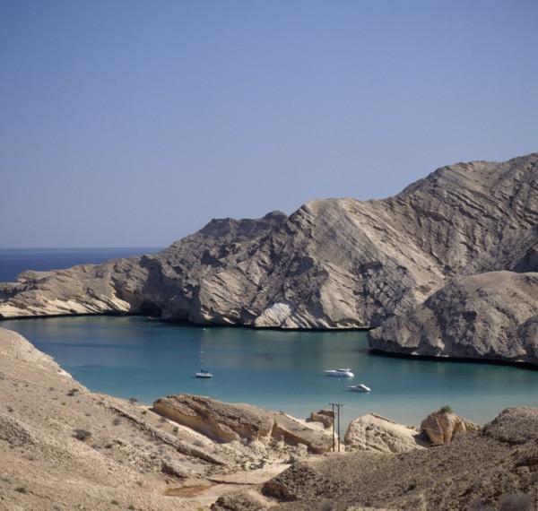 OMAN, Capital Area, Bander Jissah, "Gulf of Oman. View from coastline over bay with yachts and a