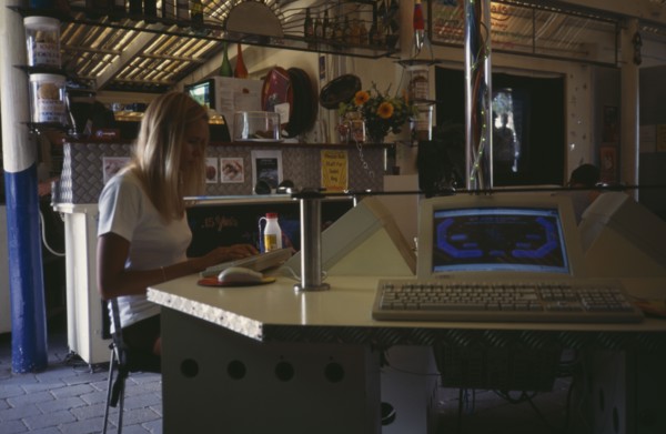 COMPUTERS , World Wide Web, Internet Cafe, AUSTRALIA Byron Bay. Internet cafe with girl at computer