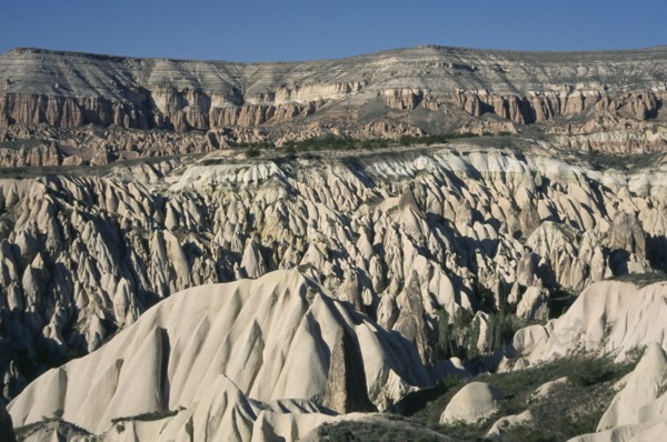 TURKEY, Cappadocia , Rose Valley, Valley with peaks and pinnacles of volcanic rock formations near