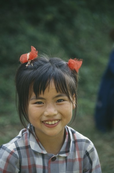 CHINA, General, People, Young girl with ponytails smiling