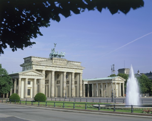 GERMANY, Berlin State, Berlin, Brandenburg Gate showing the front and one side with a fountain in