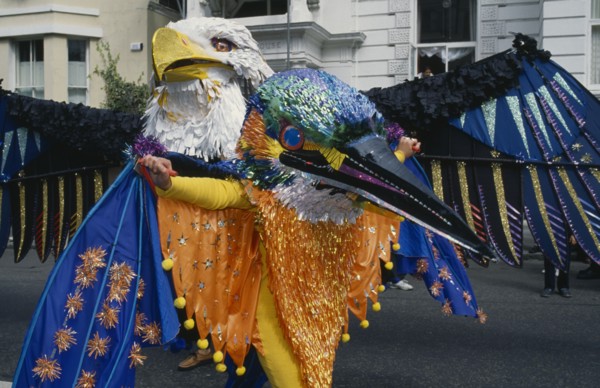 ENGLAND, London, "Notting Hill Carnival, dancers in Eagle and Kingfisher costumes. "