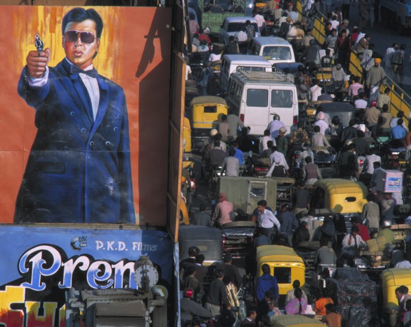 INDIA, Uttar Pradesh, Delhi, "Crowded street of Chandni Chowk with trucks, trishaws and people by