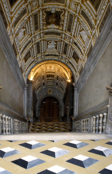 ITALY, Veneto, Venice, Doges Palace interior showing golden staircase detail