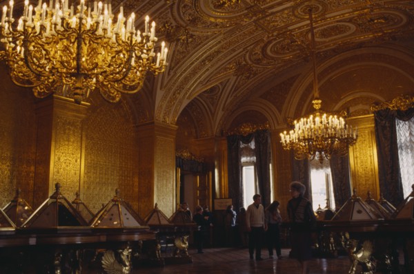 RUSSIA, St Petersburg, "The Hermitage Museum interior, gilted room with display cabinets &