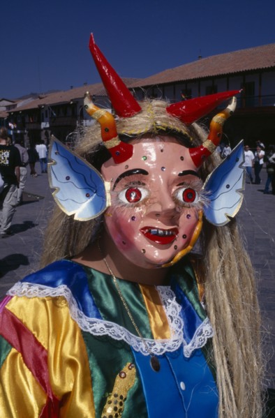 PERU, Cusco, Masked figure at Inti Raymi.  Head and shoulders shot.    Cuzco