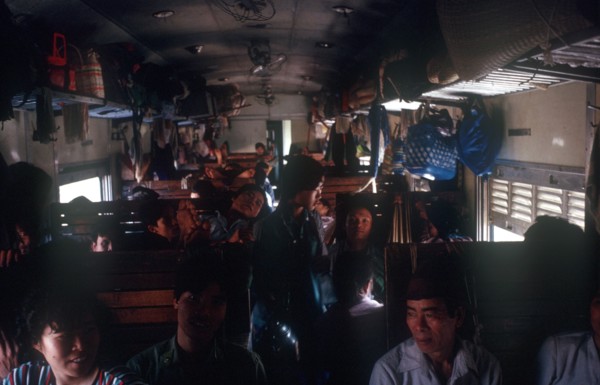 VIETNAM, Transport, The crowded interior of a third class train compartment travelling from Nhetang