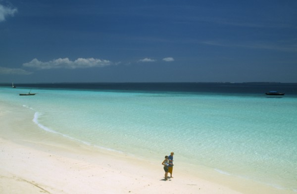 TANZANIA, Zanzibar Island, "Nungwi.  View along beach with white sand and aquamarine sea, towards