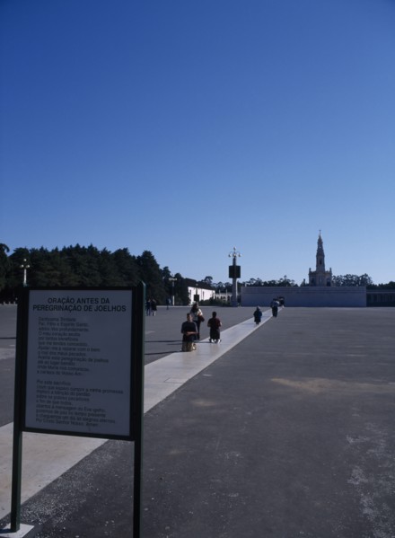 PORTUGAL, Beira Litoral, Fatima, Pilgrims approaching shrine on their knees whilst praying