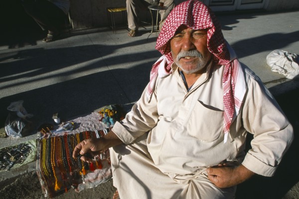 SYRIA, Central, Dayr-az-Zawr, Prayer bead vendor on roadside.