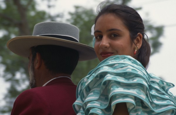 SPAIN, Andalucia, Jerez de la Frontera, Close shot of couple in traditional dress at Jerez Horse