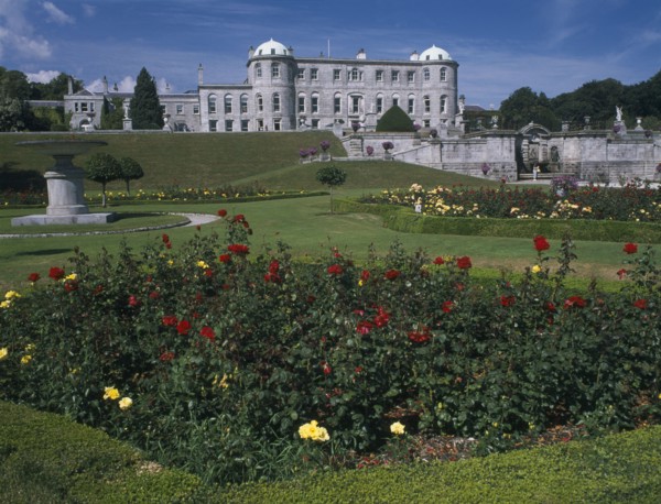 IRELAND, County Wicklow, Powerscourt House, View over formal gardens towards exterior facade.