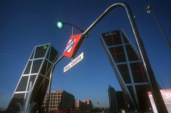 SPAIN, Madrid, Paseo de La Castellana. Puerta de Europa office complex at entrance to business