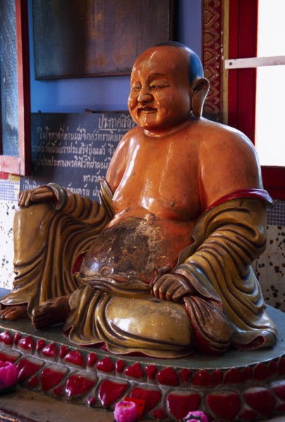 MALAYSIA, Penang, Georgetown, Wat Chayamangkalaram.  Interior with laughing Buddha figure.