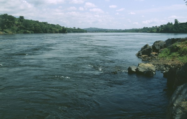 UGANDA, Jinga River, View down river bridge in distance Source of the Nile