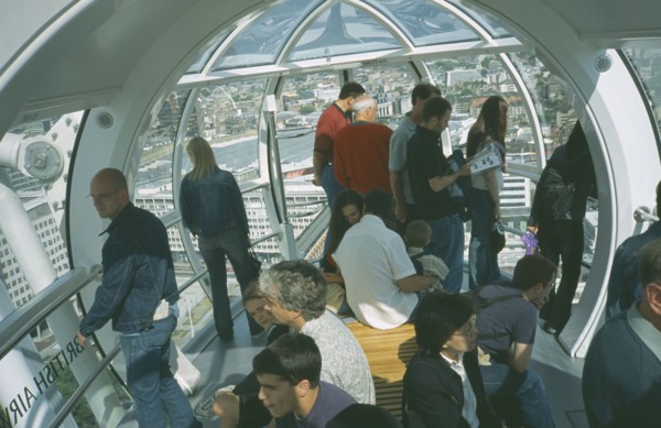 ENGLAND, London, British Airways London Eye Milennium wheel interior of capsule with tourists