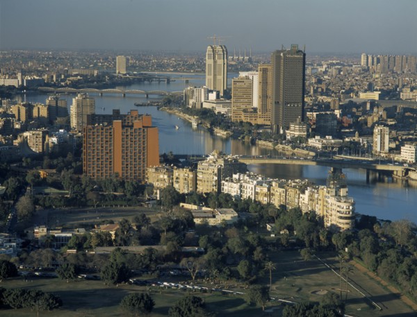 EGYPT, Cairo Area, Cairo, Elevated view looking Northwest over the Nile with tall city buildings