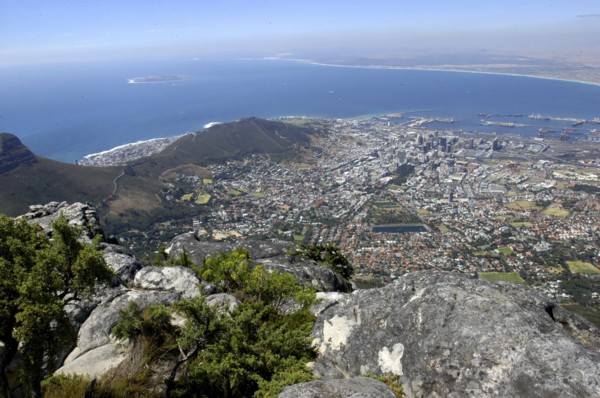 SOUTH AFRICA, Western Cape, Cape Town, Aerial view from mountain top over city below and coastline