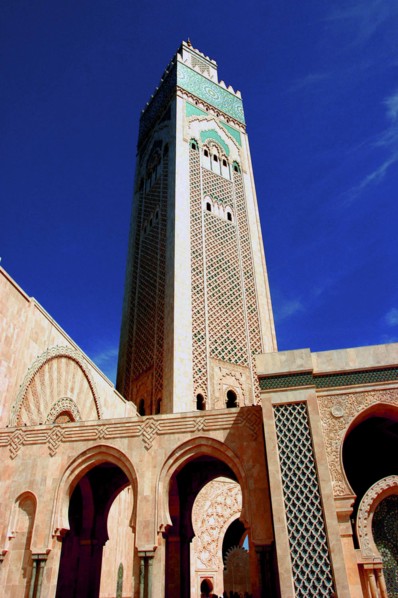 MOROCCO, Casablanca, Angled view looking up at the tower of Hassan II Mosque
