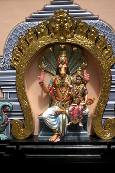 SINGAPORE, Central, Chinatown, Sri Mariamman Temple. Detail of brightly coloured Hindu carvings