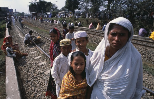 BANGLADESH, Dhaka, Muslim men and women gathered along the railway track at Biswas Ijtema with