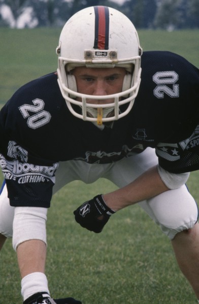 SPORT, Ball Games, American Football, British American footballer wearing body protector and helmet