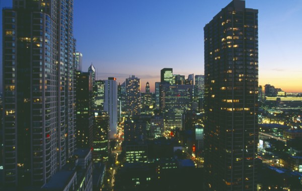 USA, Illinois, Chicago, Cityscape at night looking south down Rush and Wabash streets in the Near