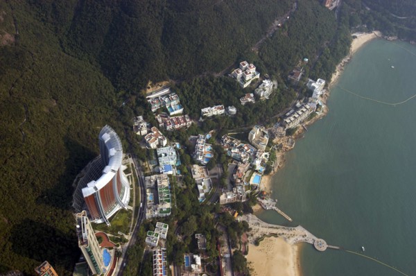HONG KONG, General, Aerial view looking directly down on section of coastline with sandy beach and