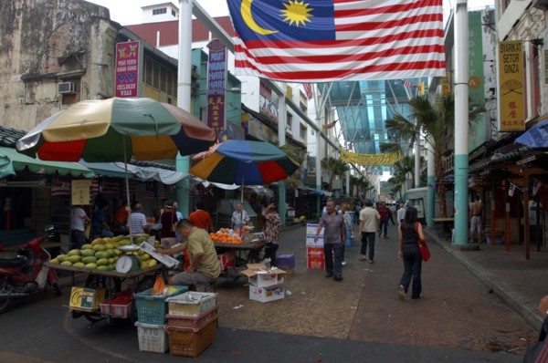 MALAYSIA, Kuala Lumpur, Chinatown, View along a market street lined with stallls