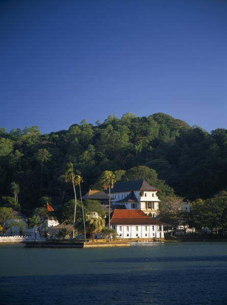 SRI LANKA, Kandy, Temple of the Tooth aka Dalada Maligawa. View over river toward the Buddhist