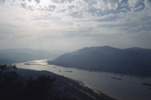 HUNGARY, River Danube, Bend in river and surrounding landscape in low light.