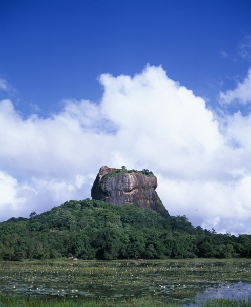 SRI LANKA, Sigiriya, View over lily pond toward the Lion Rock monolith