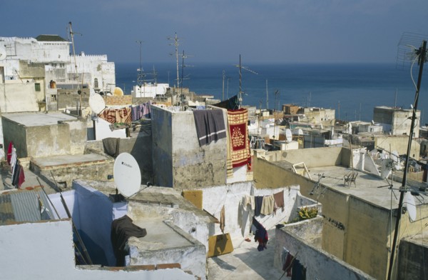 MOROCCO, Tangier, View over rooftops with satelite dishes visible