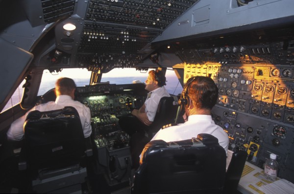 SOUTH AFRICA, Central, South African Airways Boeing 747 300 cockpit with pilot and crew at daybreak