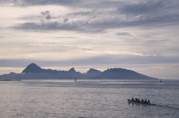 PACIFIC ISLANDS, French Polynesia, Tuamotu Islands, Ringiroa.  Kayak on water in low light with