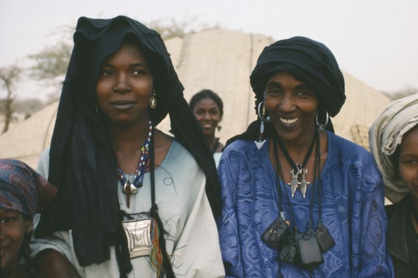 NIGER, Tribal People, Head and shoulders portrait of two Tuareg women near Tanout wearing typical