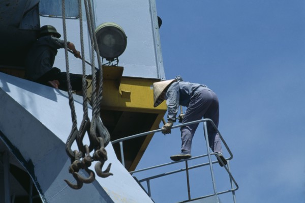 VIETNAM, North, Haiphong, Maintenance worker at Doan Xa container terminal.