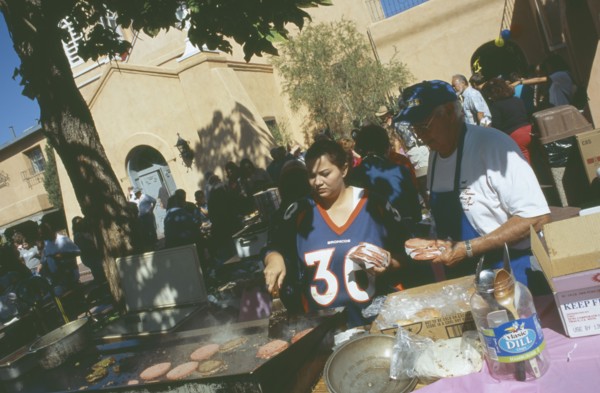 USA, New Mexico, Albuquerque, Making burgers in San Felipe de Neri church grounds in the old town