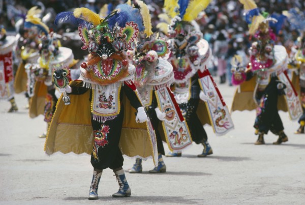 BOLIVIA, Oruro, Carnival masqueraders in colourful animal costumes