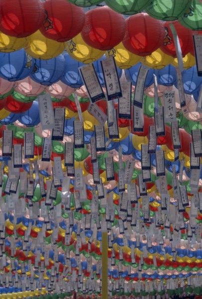 SOUTH KOREA, Seoul, Jogyesa Temple.  Canopy of paper lanterns and prayer streamers hung to