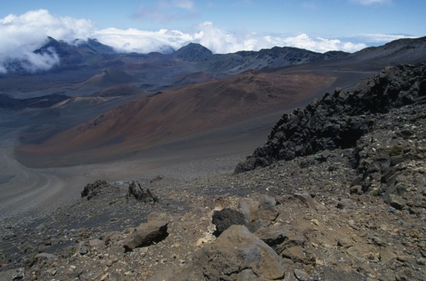 USA, Hawaii, Maui, Cinder cones and iron rich lava weathered to brown oxide in the vast crater of