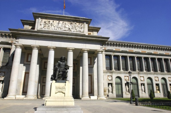 SPAIN, Madrid, Prado Museum columned entrance with statue outside