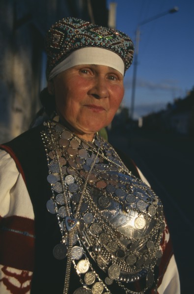 ESTONIA, Rakvere, Folk dancer in traditional costume.  Portrait.