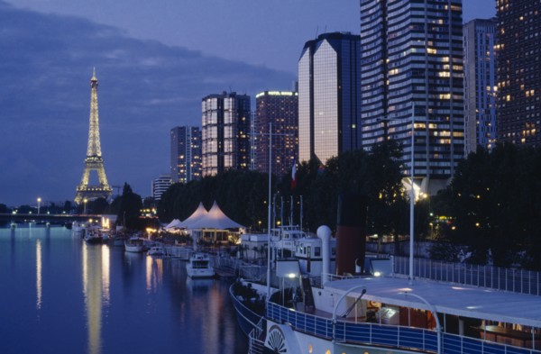 FRANCE, Ile de France, Paris, Modern high rise buildings and the Eiffel Tower from the banks of the