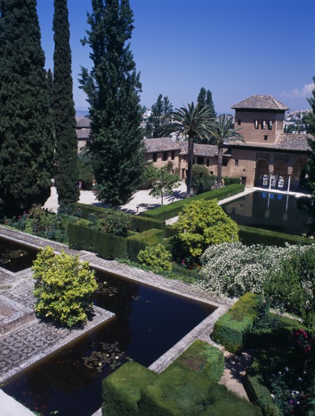 SPAIN, Andalucia, Granada, The Alhambra. Jardins de Partal with the Palace of the Maids beyond