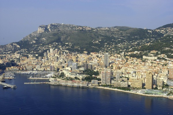MONACO, Cote d Azur, Monte Carlo, Aerial view from the sea toward the coastal city and harbour